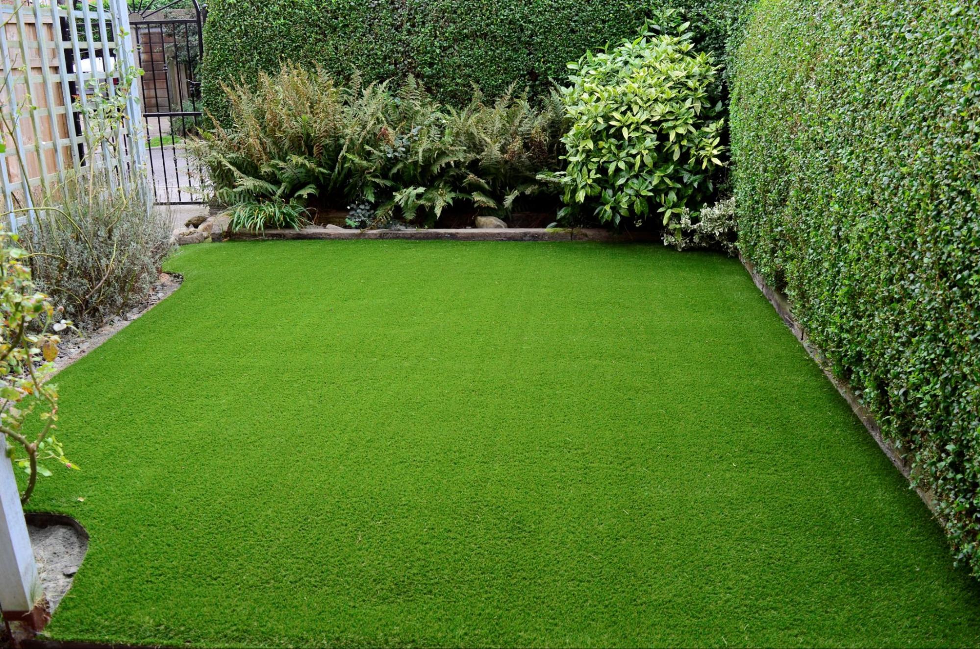 Beautiful artificial turf installation with lake view